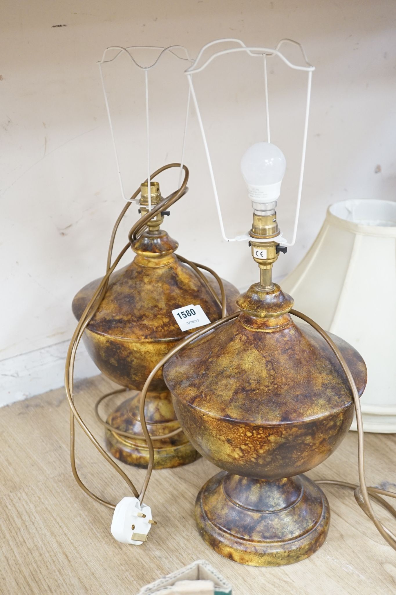 A pair of toleware table lamps.